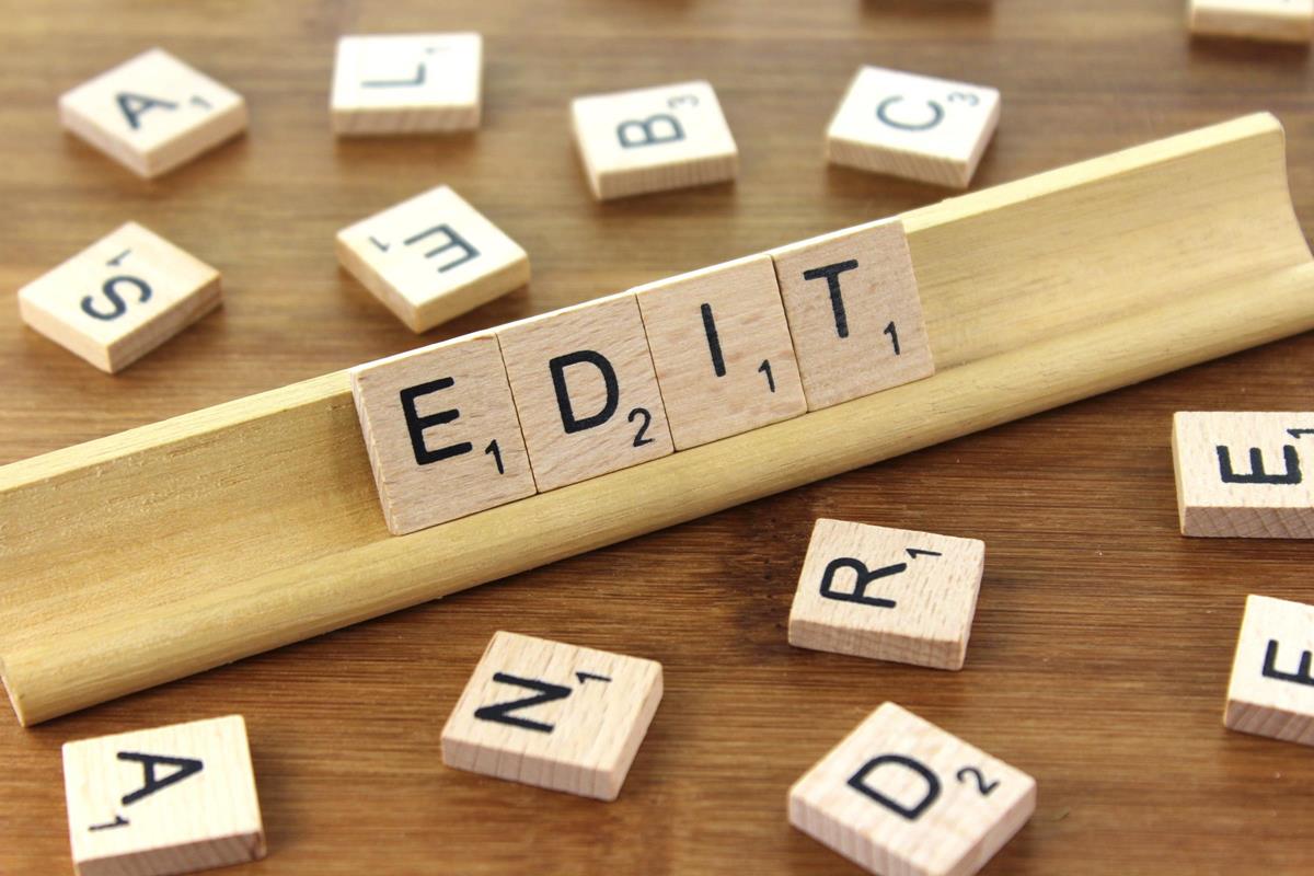 scrabble tiles arranged to spell 'edit'