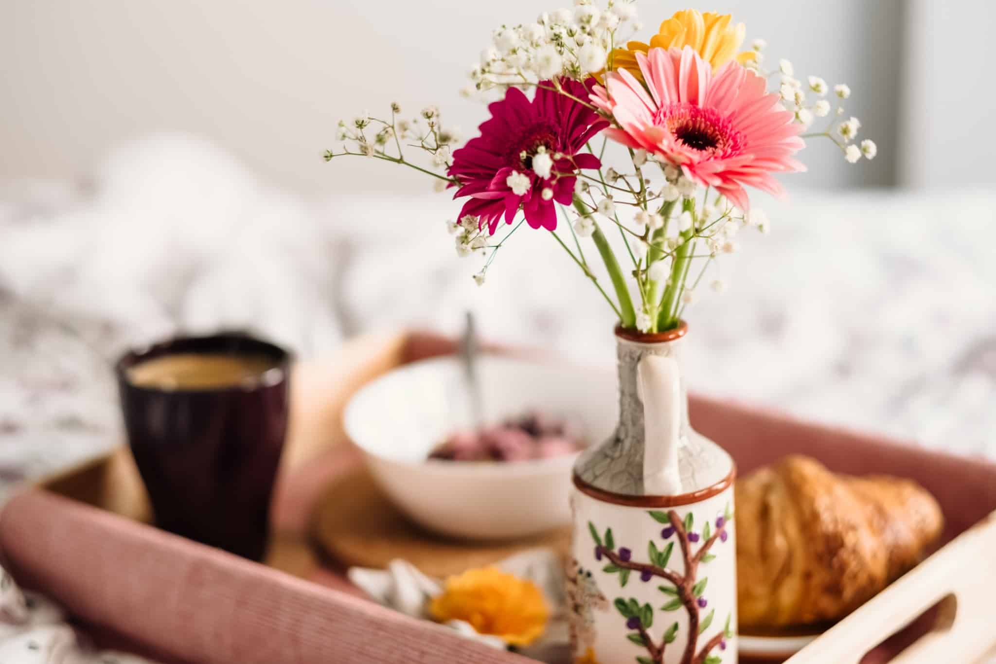 A breakfast tray with flowers