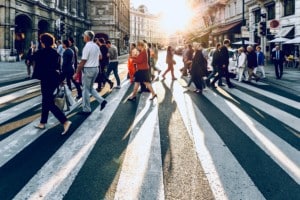 People walking across street