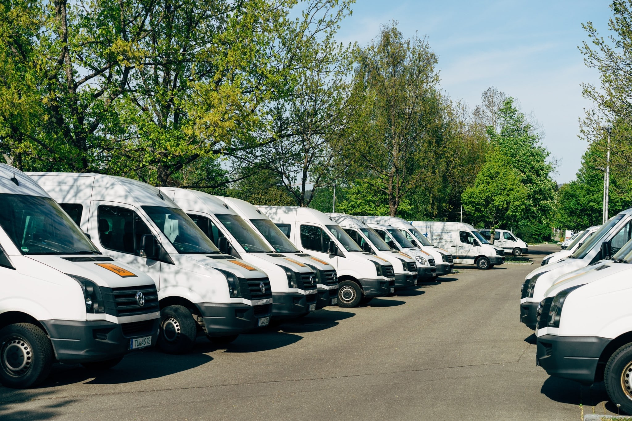 cars parked on parking lot during day time