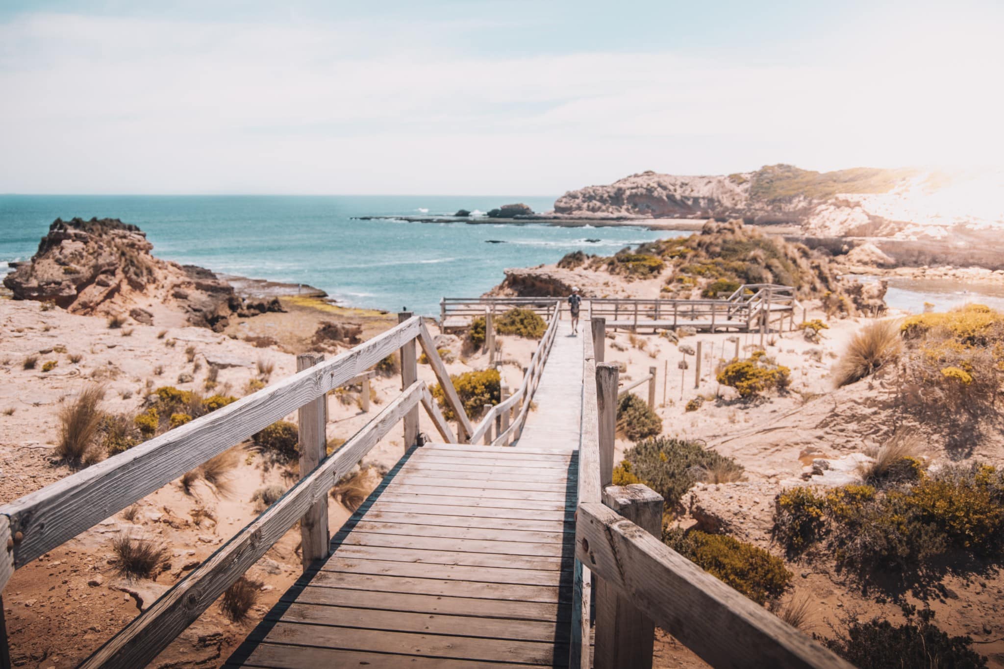 Destination brown wooden dock on beach during daytime