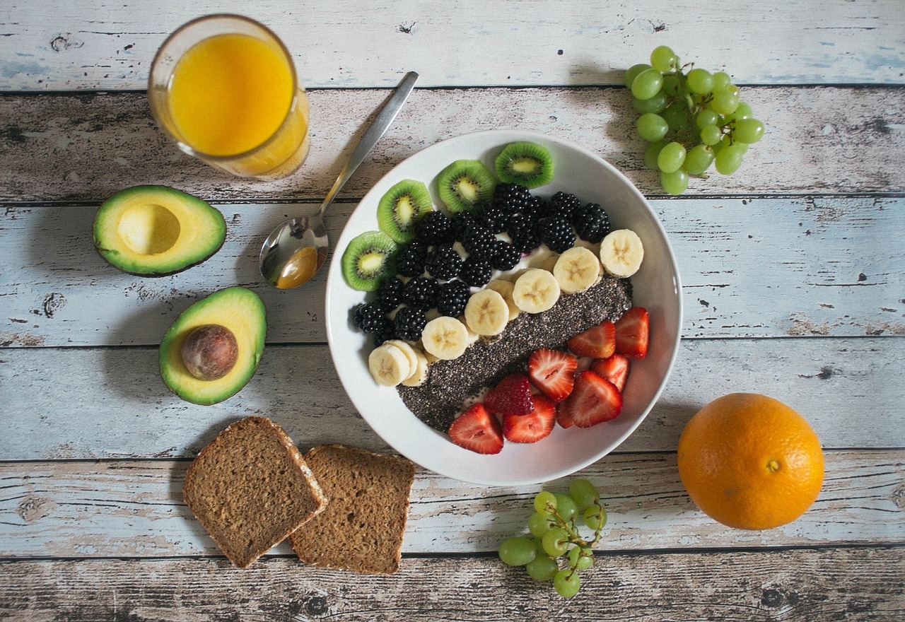 A bowl filled with fresh fruit and yoghurt
